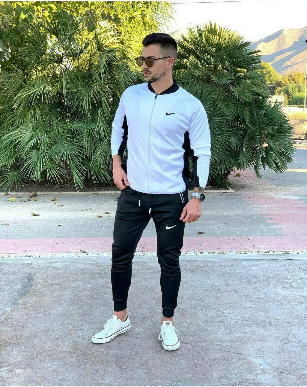 CHÁNDAL NIKE CHAQUETA CREMALLERA Y PANTALONES CON BOLSILLOS REFLECTANTES